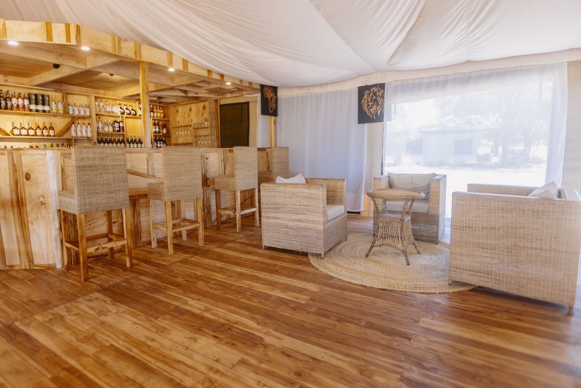 Bar lounge with seating inside the tent, Ndutu