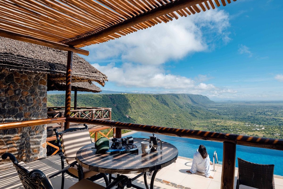 Covered terrace with table and views into the valley